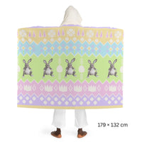 Back view of an Easter themed OSRS hooded sherpa fleece blanket with colorful seasonal pattern, Old School RuneScape merch blanket and a cheerful gift for gamers