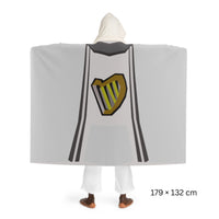 Back view of a Music skillcape hooded sherpa fleece blanket, inspired by Old School RuneScape, a cozy OSRS merch blanket and a unique gift for gamers