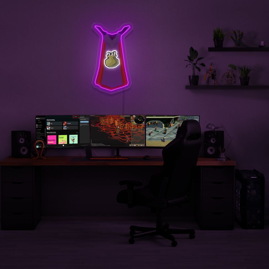 The Runescape Cooking Cape LED neon sign is positioned above a gaming PC, featuring the cooking pot symbol from the game. This LED neon sign adds a nostalgic touch to your gaming setup, reminding players of their cooking endeavors in RuneScape.