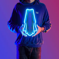 Man proudly holding Runescape Guthix max Cape LED neon sign