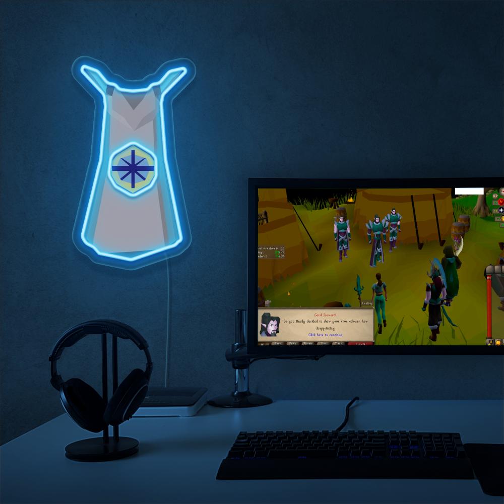 The Runescape Quest Skillcape LED neon sign proudly sits next to a gaming PC, symbolizing the dedication and perseverance of players in completing quests in Old School RuneScape. An emblem of achievement and adventure, this LED neon sign adds a touch of excitement and pride to any gaming space. 