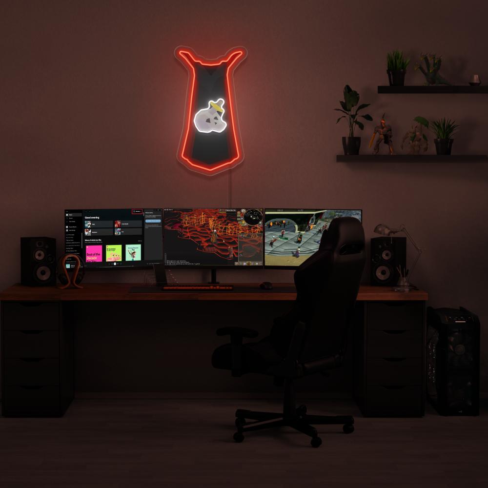 Illuminate your gaming setup with the Runescape Slayer Skillcape LED neon sign mounted above a gaming PC. The Slayer skillcape represents the mastery and combat prowess of slayers in RuneScape. A perfect addition to the room, this LED neon sign enhances the ambiance for RuneScape enthusiasts.