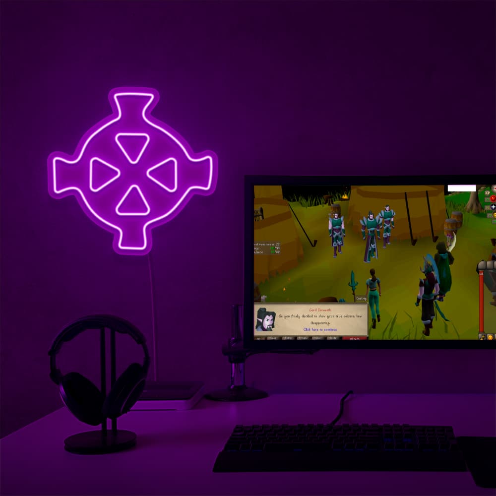 The Runescape Zaros Symbol LED neon sign proudly sits next to a gaming PC, symbolizing the power and influence of Zaros in RuneScape. An emblem of ancient magic and mystery, this LED neon sign adds a touch of intrigue and mystique to any gaming space.