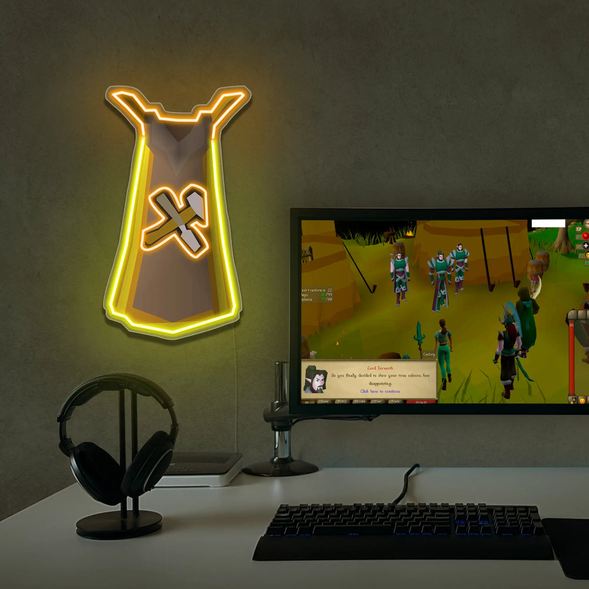 Runescape Crafting cape Neon sign shaped on a desk with a computer screen displaying a video game.