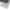 Gf noob OSRS sticker placed on laptop surface, Old School RuneScape chat phrase merch decal