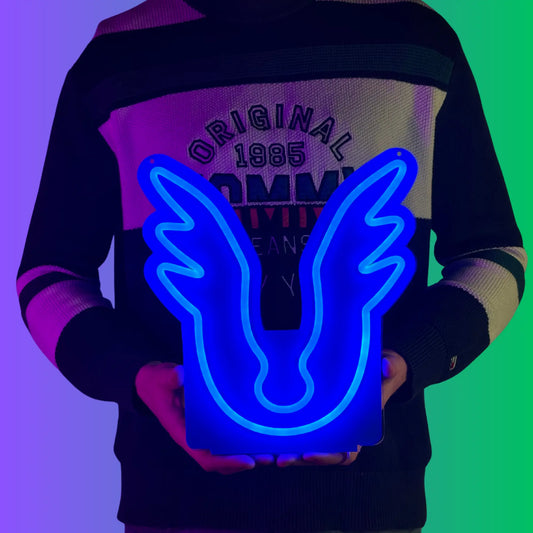 A man proudly holding a LED neon sign of the Armadyl God Symbol, a revered icon from Runescape.