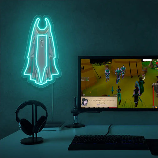 Runescape Assembler Max Cape LED Neon sign hanging next to an advanced gaming setup, adding a warm glow. Perfect gift for Old School Runescape (OSRS) players to enhance their gaming environment.