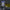 RuneScape Defence Skillcape LED neon sign in gaming setup with monitors – OSRS room decor