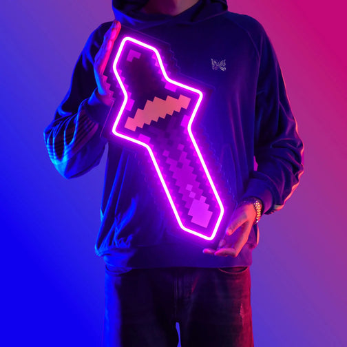A person proudly displays the OSRS Melee Protect LED neon sign, featuring the iconic Melee Protect symbol from the game. This LED neon sign represents the defensive capabilities of warriors in Old School RuneScape. A powerful and protective addition to any gaming space. 