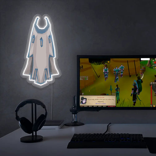 Runescape Mythical Max Cape LED Neon sign hanging next to an advanced gaming setup, adding a warm glow. Perfect gift for Old School Runescape (OSRS) players to enhance their gaming environment.