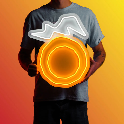 A person proudly displays the OSRS Seers Ring LED neon sign, featuring the iconic Seers Ring item from the game. This LED neon sign symbolizes the magic and wisdom of the Seers in Old School RuneScape. A symbol of enchantment and insight, it adds a touch of mystique to any gaming space.