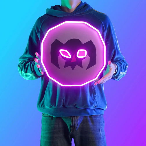 A person proudly displays the OSRS Wrath Rune LED neon sign, featuring the iconic Wrath Rune from the game. This LED neon sign symbolizes the power and might of wrath runes in Old School RuneScape. A symbol of magic and destruction, it adds a touch of mystique to any gaming space.
