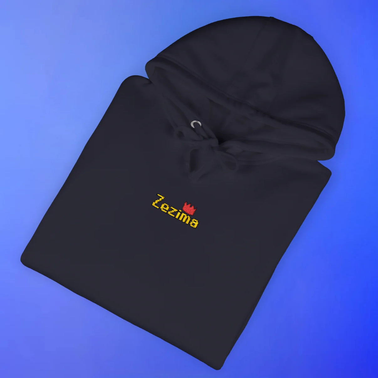 Folded black hoodie with Zezima OSRS embroidery detail, Old School RuneScape merch clothing apparel and a nostalgic gift for gamers