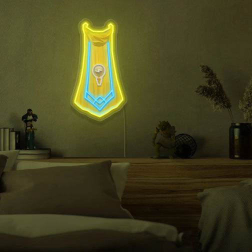 RS3 Invention Cape LED neon sign mounted above a sleeping bed. Add a touch of gaming flair to your bedroom with this LED neon sign, featuring the Invention cape from RS3, perfect for RuneScape enthusiasts looking to decorate their space.