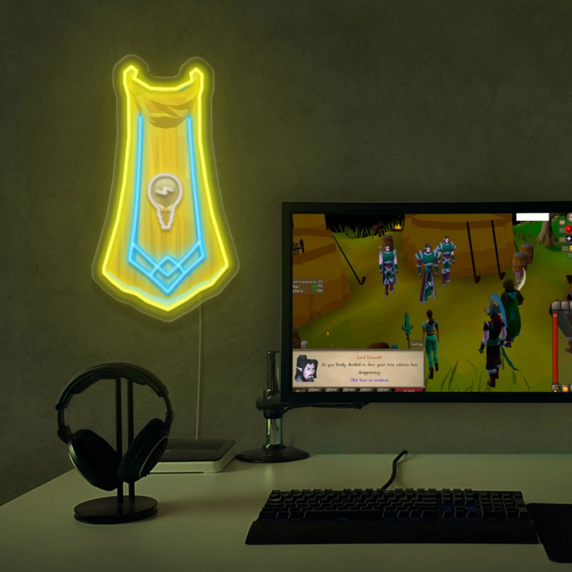 RS3 Invention Cape LED neon sign placed next to a gaming PC. Enhance your gaming setup with this LED neon sign, featuring the Invention cape from RS3, perfect for RuneScape fans seeking to personalize their gaming space.