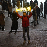 A Runescape enthusiast proudly displays the custom Runescape Buying BF LED neon sign in a public setting, showcasing their passion for the iconic phrase from Old School Runescape.