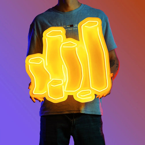 A man proudly holds the Runescape Coins LED neon sign, symbolizing achievement and financial success. This LED neon sign, featuring stacks of coins from RuneScape, exudes a sense of accomplishment and wealth.