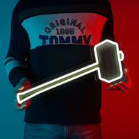 A man proudly holding a granite maul, a iconic weapon from Runescape, depicted on a LED neon sign.