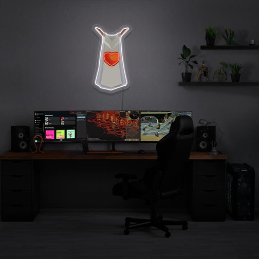 The Runescape Hitpoints Skillcape LED neon sign shines brightly above a gaming PC, symbolizing the endurance and vitality of RuneScape adventurers. A nostalgic and empowering gift for Runescape enthusiasts.