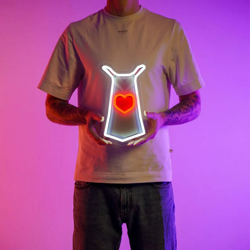 A person proudly displays the Runescape Hitpoints Skillcape LED neon sign, symbolizing the endurance and vitality of RuneScape adventurers. A nostalgic and empowering gift for Runescape enthusiasts.