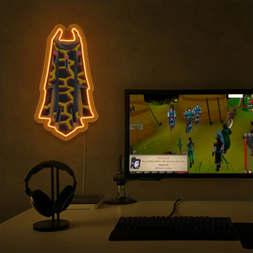 The Runescape Infernal Max Cape LED neon sign proudly sits next to a gaming PC, symbolizing the dedication and skill required to achieve the Infernal Max Cape in Old School RuneScape. An emblem of achievement and excellence, this LED neon sign adds a touch of nostalgia and pride to any gaming space.