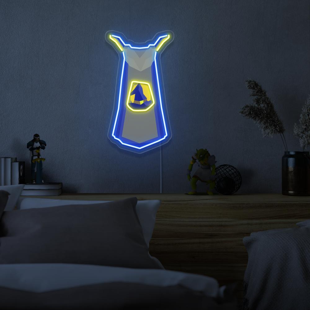 Mount the Runescape Magic Skillcape LED neon sign above your bed to inspire dreams of mastering the arcane arts in Old School RuneScape. The iconic Magic Skillcape represents expertise and mastery. A perfect addition to any bedroom, this LED neon sign infuses the space with magic and inspiration.