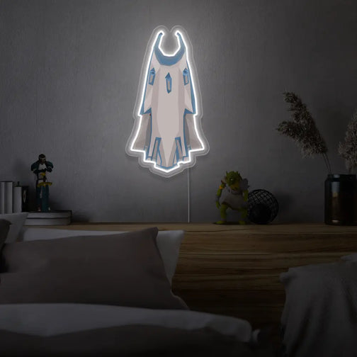 Runescape Mythical Max Cape LED Neon sign hanging above a bed in a bedroom, casting a soothing light. This OSRS-themed gift is perfect for Runescape fans looking to decorate their space.