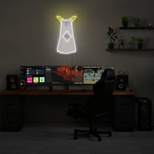 Illuminate your gaming setup with the Runescape Prayer Skillcape LED neon sign mounted above a gaming PC. The iconic Prayer Skillcape symbolizes devotion and spiritual strength in Old School RuneScape. A perfect addition to the room, this LED neon sign enhances the ambiance for RS enthusiasts.