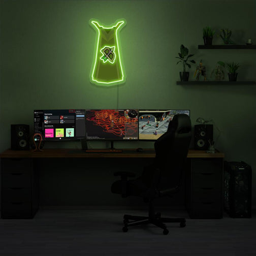 Illuminate your gaming setup with the Runescape Ranged Skillcape LED neon sign mounted above a gaming PC. The iconic Ranged Skillcape symbolizes mastery of ranged combat in Old School RuneScape. A perfect addition to the room, this LED neon sign enhances the ambiance for RS enthusiasts.