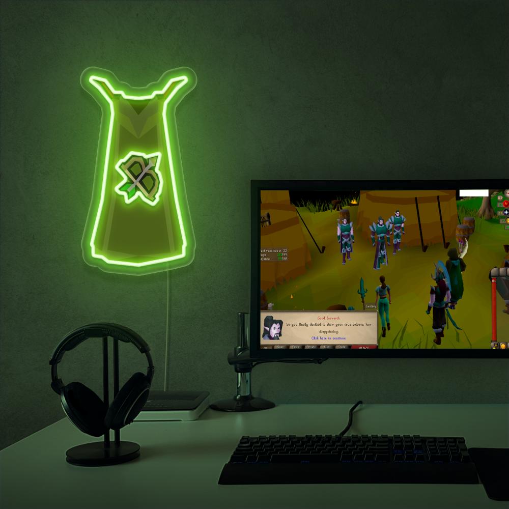 The Runescape Ranged Skillcape LED neon sign proudly sits next to a gaming PC, symbolizing the precision and agility of players in ranged combat in Old School RuneScape. An emblem of marksmanship and expertise, this LED neon sign adds a touch of focus and determination to any gaming space.