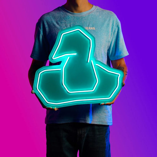 A person proudly displays the Runescape Wizard Hat LED neon sign, featuring the iconic Wizard Hat from the game. This LED neon sign symbolizes the magic and mystique of wizards in RuneScape. A symbol of arcane knowledge and power, it adds a touch of enchantment to any gaming space.