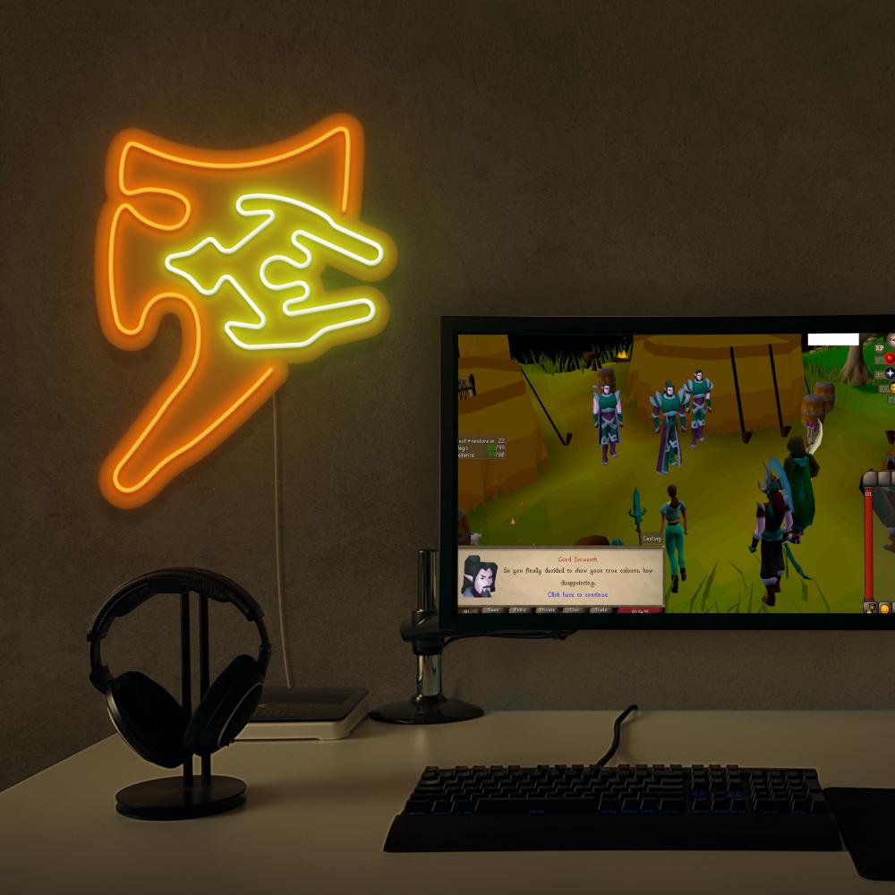 Elevate your gaming setup with the OSRS Arcane Spirit Shield LED neon sign placed next to a gaming PC. This LED neon sign, featuring the iconic arcane spirit shield from Old School RuneScape, infuses your gaming space with mystical energy and inspiration.
