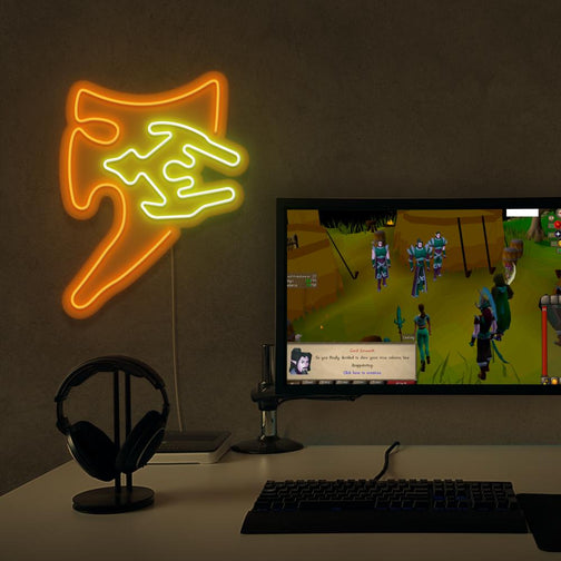 Elevate your gaming setup with the OSRS Arcane Spirit Shield LED neon sign placed next to a gaming PC. This LED neon sign, featuring the iconic arcane spirit shield from Old School RuneScape, infuses your gaming space with mystical energy and inspiration.
