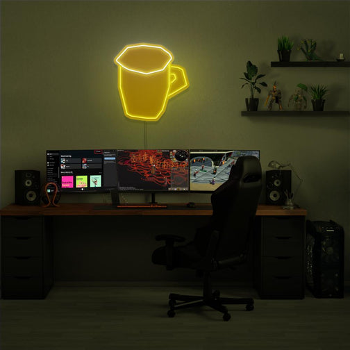 Illuminate your gaming setup with the OSRS Beer Glass LED neon sign mounted above a gaming PC. This LED neon sign, featuring the iconic beer glass from Old School RuneScape, adds a touch of nostalgia and relaxation to your gaming space.