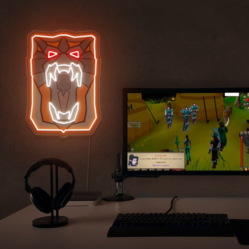 Elevate your gaming space with the OSRS Dragon Fire Shield LED neon sign positioned near a gaming PC. Featuring the iconic fire shield symbol from the game, this LED neon sign adds a touch of adventure to your setup, reminiscent of your fiery battles in RuneScape. This is a unique gift for your RuneScape buddy, evoking nostalgic memories. 