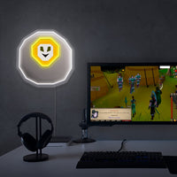 RuneScape Happy Chaos Rune LED neon sign in gaming setup with monitors – OSRS room decor