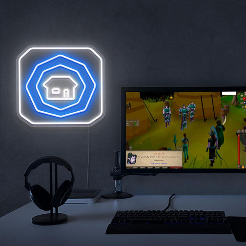 The OSRS Home Tablet LED neon sign sits proudly next to a gaming PC, symbolizing the convenience and practicality of Old School RuneScape. A unique gift for OSRS enthusiasts seeking adventure.