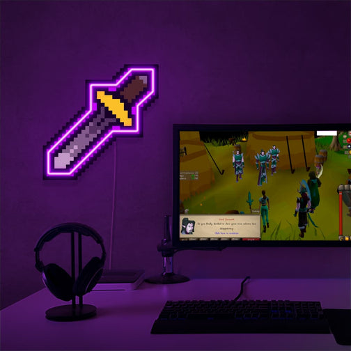 The OSRS Melee Protect LED neon sign proudly sits next to a gaming PC, symbolizing the defensive capabilities of warriors in Old School RuneScape. An emblem of protection and strength, this LED neon sign adds a touch of power and resilience to any gaming space. 