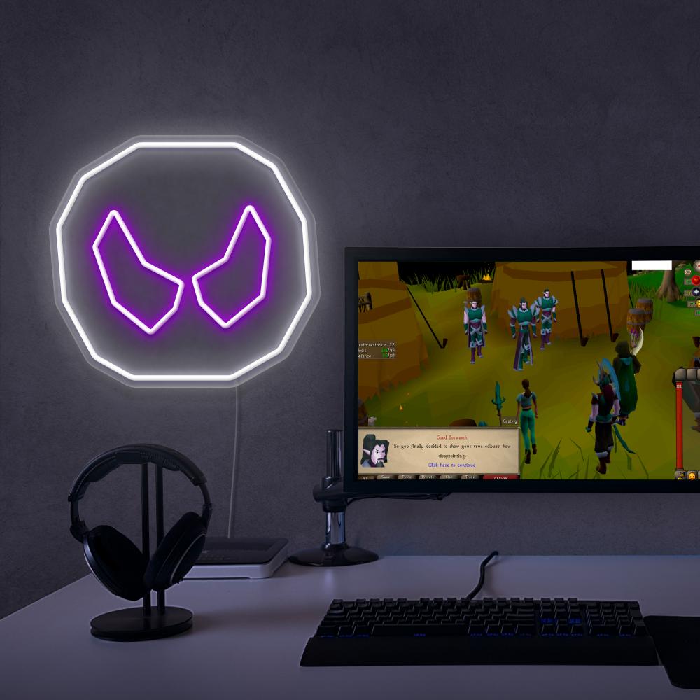 The OSRS Soul Rune LED neon sign proudly sits next to a gaming PC, symbolizing the mystical power and essence of souls in Old School RuneScape. An emblem of magic and mystique, this LED neon sign adds a touch of enchantment and intrigue to any gaming space.