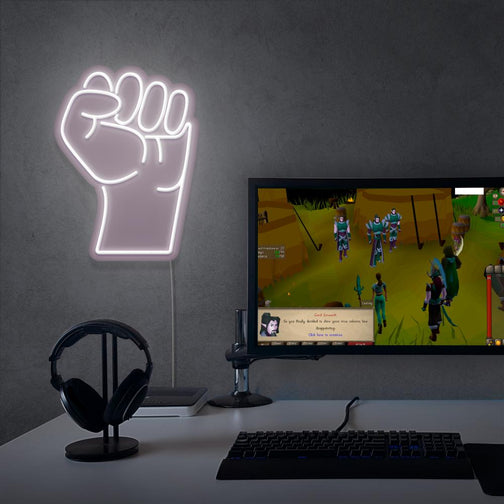 The OSRS Strength LED neon sign proudly sits next to a gaming PC, symbolizing the physical power and might of adventurers in Old School RuneScape. An emblem of determination and strength, this LED neon sign adds a touch of resilience and power to any gaming space.