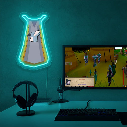 The OSRS Summoning Skillcape LED neon sign proudly sits next to a gaming PC, symbolizing the mystical power and ability to summon creatures in Old School RuneScape. An emblem of magical prowess and connection to otherworldly beings, this LED neon sign adds a touch of enchantment and wonder to any gaming space.