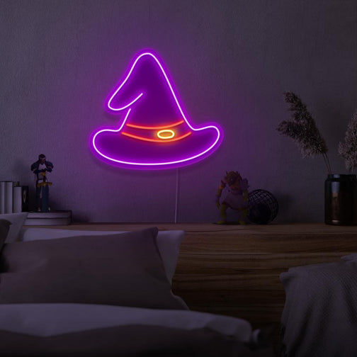 Mount the OSRS Wizard Hat LED neon sign above your bed to inspire dreams of magic and mystique in Old School RuneScape. The Wizard Hat represents the arcane knowledge and power of wizards. A perfect addition to any bedroom, this LED neon sign infuses the space with a sense of enchantment and wonder. 