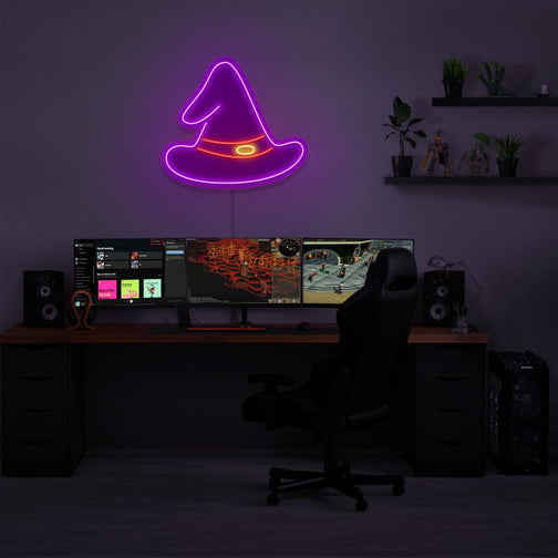 Illuminate your gaming setup with the OSRS Wizard Hat LED neon sign mounted above a gaming PC. The Wizard Hat represents the arcane knowledge and magic of wizards in Old School RuneScape. A perfect addition to the room, this LED neon sign enhances the ambiance for OSRS enthusiasts.