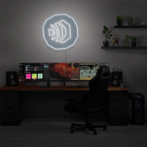 Showoff your gaming setup with the RUNESCAPE Air Rune LED neon sign mounted above a gaming PC. This LED neon sign, featuring the iconic air rune symbol from RuneScape, adds an element of mystique and wonder to your gaming environment, sparking creativity and imagination.