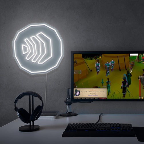Enhance your gaming setup with the RUNESCAPE Air Rune LED neon sign placed next to a gaming PC. This LED neon sign, featuring the iconic air rune symbol from RuneScape, infuses your gaming space with mystical energy and inspiration.