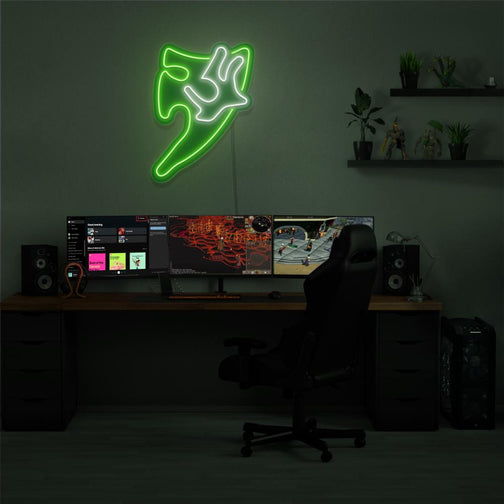 Light up your gaming setup with the Runescape Divine Spirit Shield LED neon sign mounted over a gaming PC. Featuring the iconic shield symbol from the game, this LED neon sign adds a divine aura to your gaming environment, evoking memories of your adventures in RuneScape.