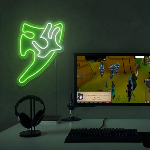 Enhance your gaming space with the Runescape Divine Spirit Shield LED neon sign placed beside a gaming PC. Featuring the iconic shield symbol from the game, this LED neon sign adds a divine touch to your setup, reminiscent of your adventures in RuneScape.