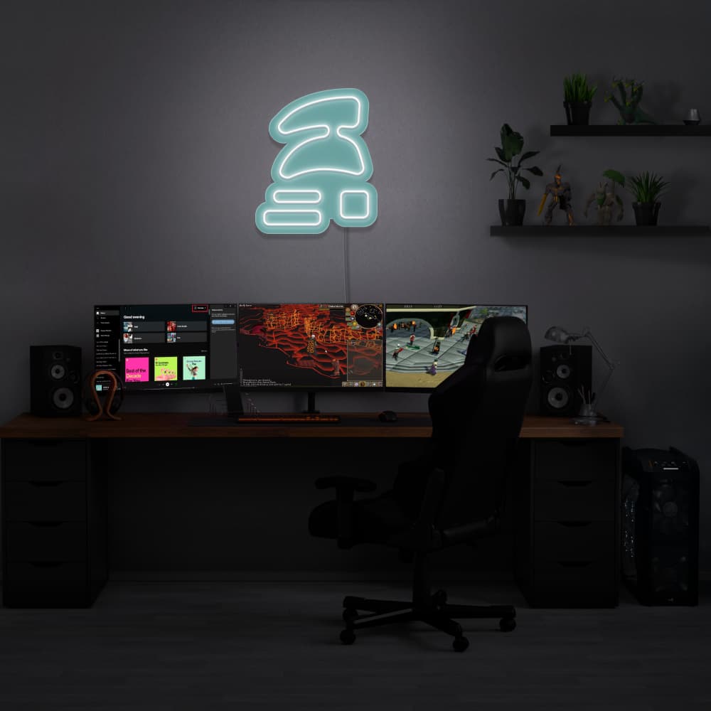 Illuminate your gaming setup with the Runescape Ironman LED neon sign mounted above a gaming PC. The iconic Ironman symbol symbolizes independence and self-reliance in Old School RuneScape. A perfect addition to the room, this LED neon sign enhances the ambiance for RS enthusiasts. 