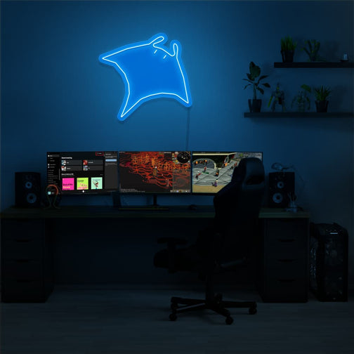 Illuminate your gaming setup with the Runescape Manta Ray LED neon sign mounted above a gaming PC. The iconic Manta Ray symbolizes sustenance and survival in Old School RuneScape. A perfect addition to the room, this LED neon sign enhances the ambiance for RS enthusiasts.