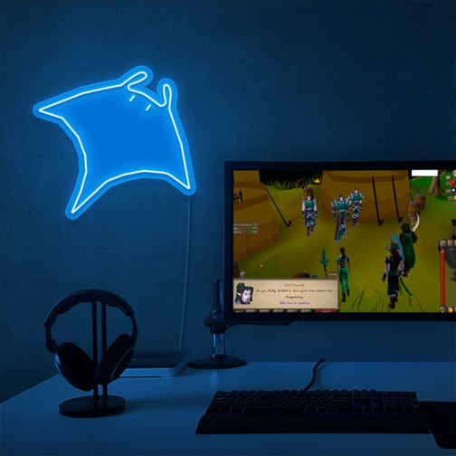 The Runescape Manta Ray LED neon sign proudly sits next to a gaming PC, symbolizing the essential role of Manta Rays as food for adventurers in Old School RuneScape. An emblem of sustenance and survival, this LED neon sign adds a touch of nostalgia and practicality to any gaming space. 